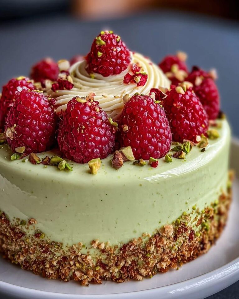 Pistachio and Raspberry Crunchy Mousse Cake