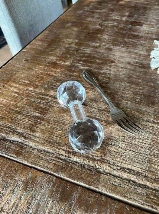 Nobody Knew What This Strange Glass Dumbbell Was
